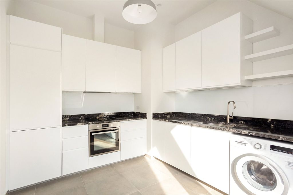 Property photo 3 of 8 Kitchen