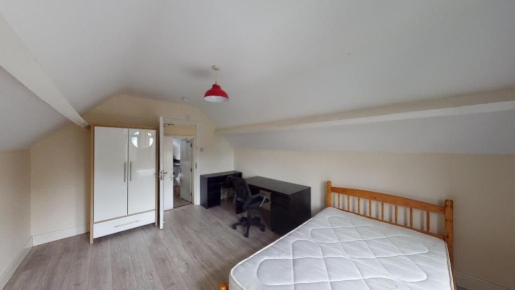 Property photo 3 of 6 A Tidy And Simple Attic Bedroom Featuring A Single...