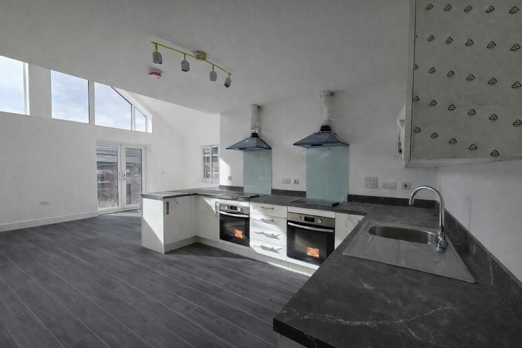 Property photo 2 of 8 Modern Kitchen Under Construction.Png