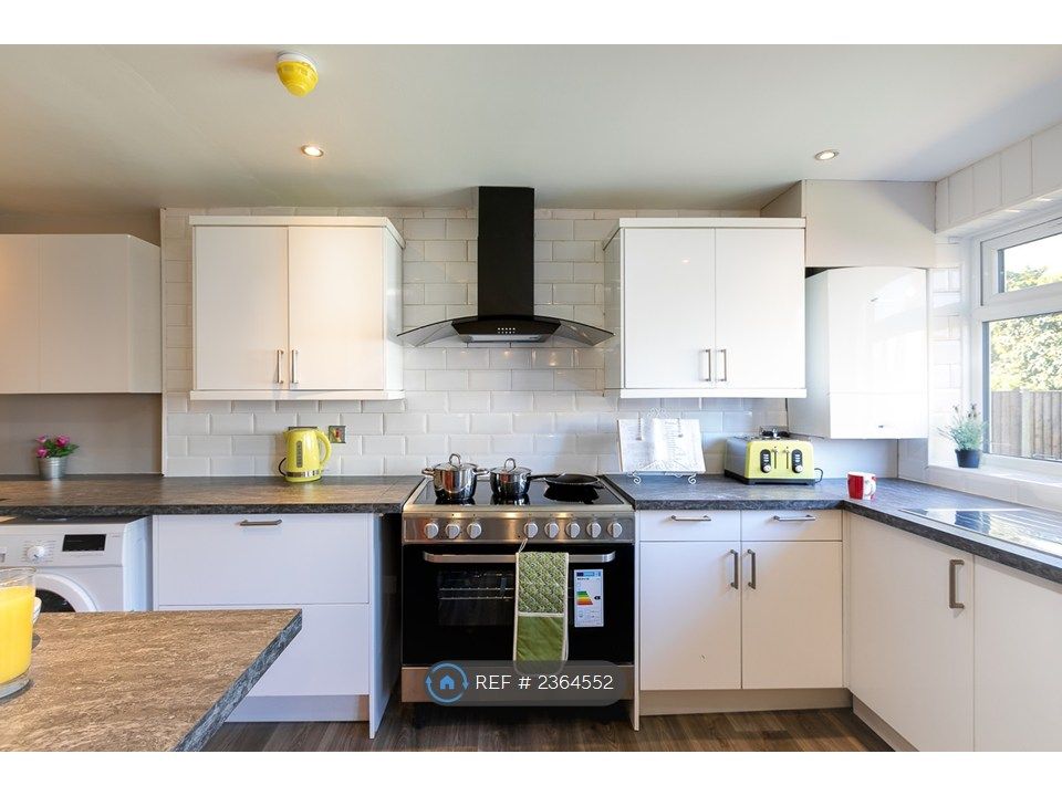 Property photo 3 of 12 Spacious Kitchen