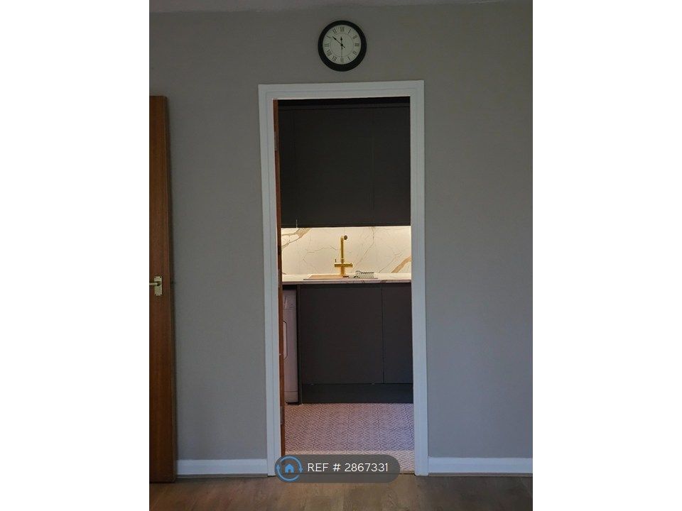 Property photo 2 of 14 Living Room Door Into Kitchen