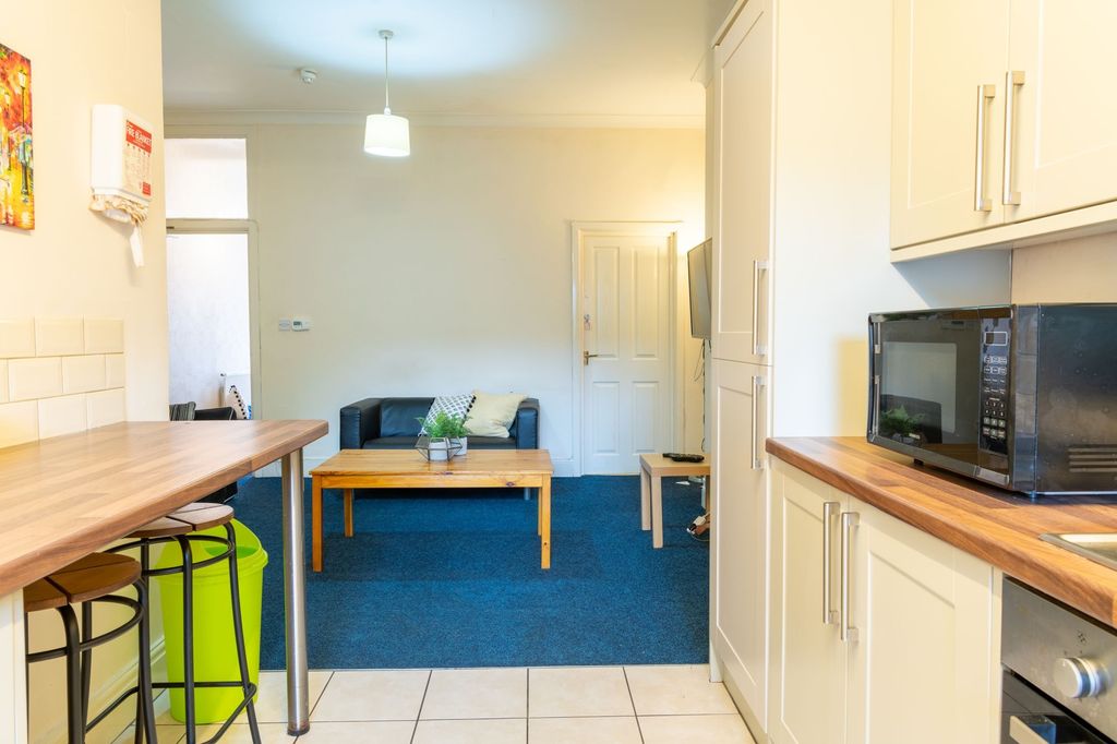 Property photo 2 of 10 Bright Open-Plan Living Area With A Compact Kitche...