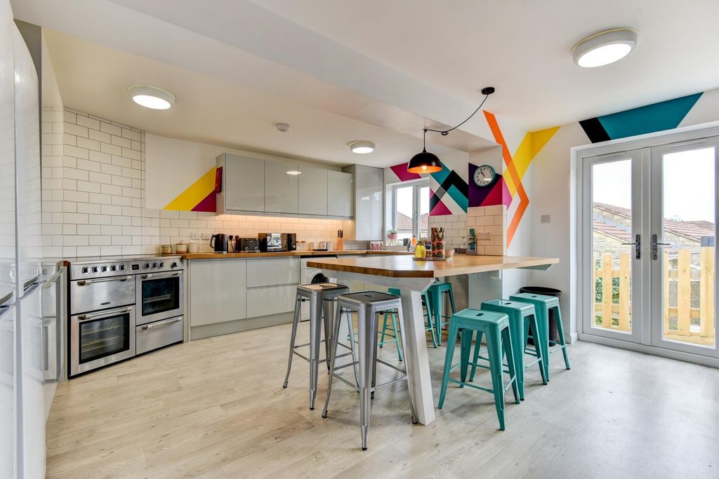 Property photo 3 of 5 This Stylish Kitchen Features Modern Appliances, A...