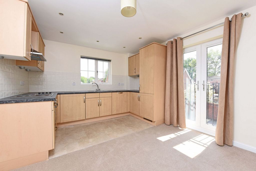 Property photo 1 of 6 Kitchen Area