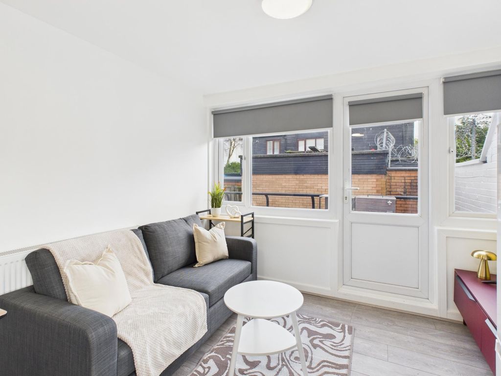 Property photo 2 of 13 Bright, Modern Living Room With A Comfortable Dark...