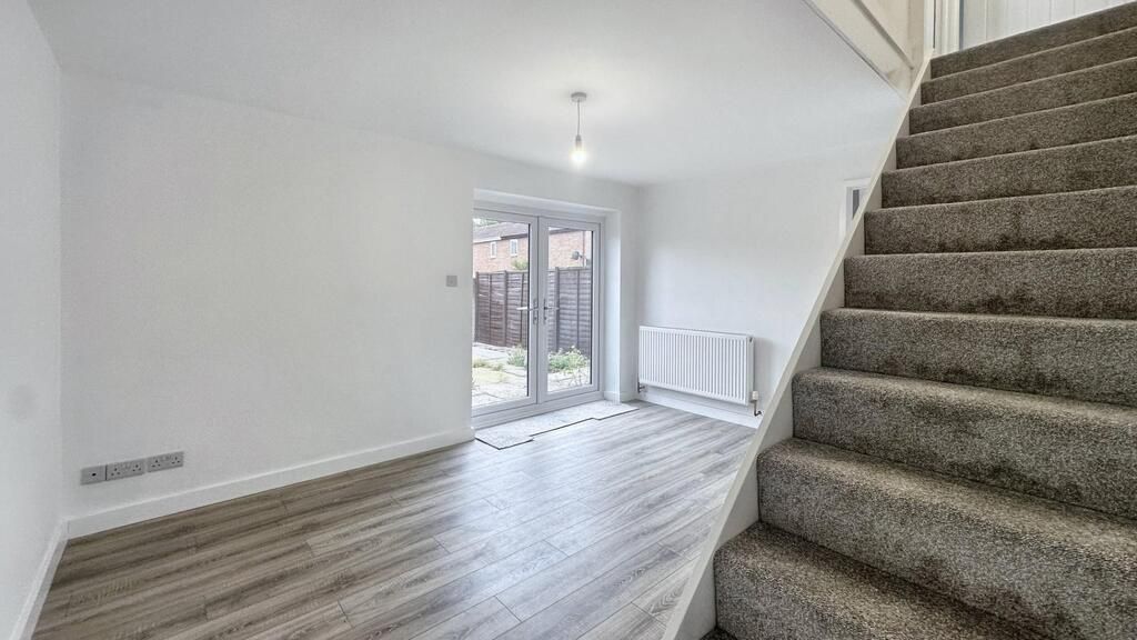 Property photo 2 of 9 Bright, Modern Living Area With Wood-Effect Floori...