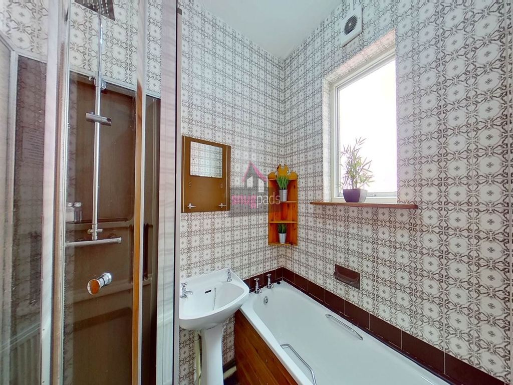Property photo 2 of 8 Bright And Clean Bathroom Featuring A Modern Bath ...