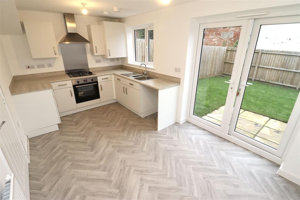 Property photo 3 of 13 Dining Kitchen
