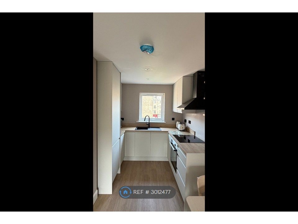 Property photo 2 of 12 Kitchen