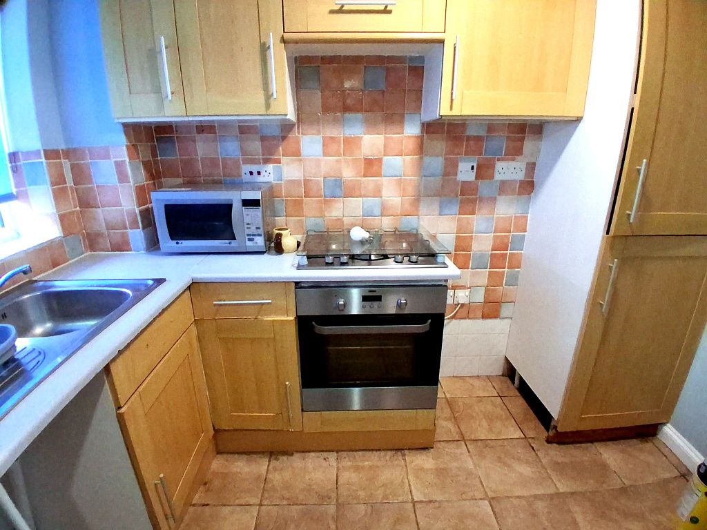 Property photo 3 of 7 Kitchen