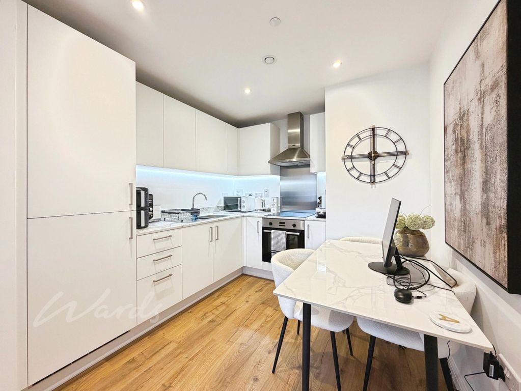 Property photo 3 of 8 Kitchen
