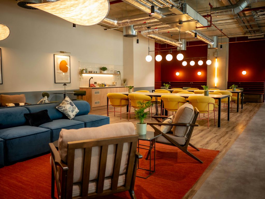 Property photo 1 of 10 2025_Quad_Osh_Coworking Area Downstairs 1.Jpg