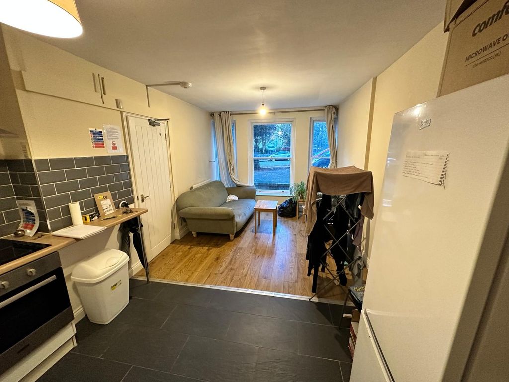 Property photo 3 of 10 A Cozy Kitchenette With Ample Natural Light, Perfe...