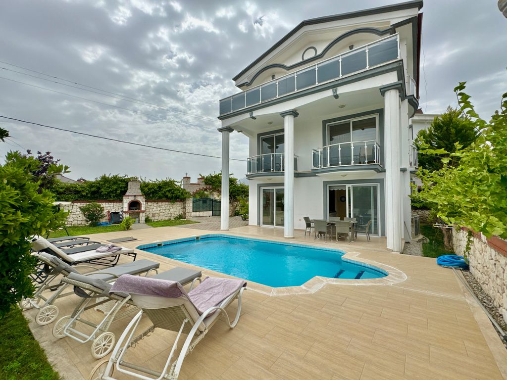 Property photo 1 of 26 Beautiful Fethiye Property For Sale Near The Beach - A Spacious Triplex Villa In Calis