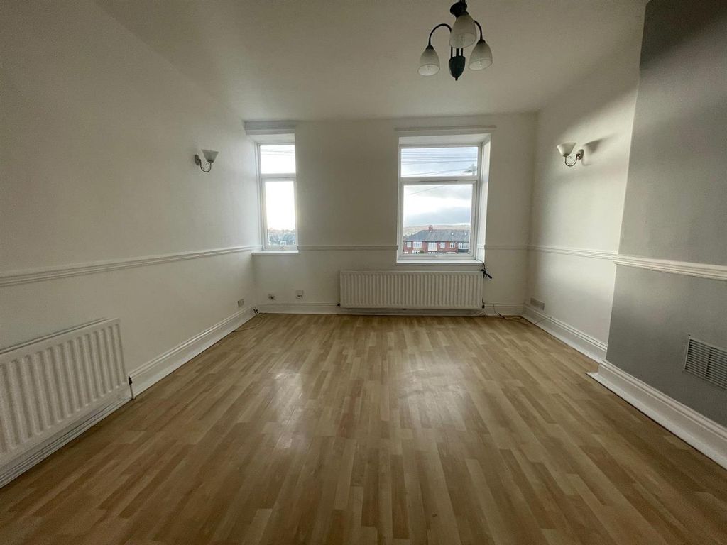 Property photo 2 of 12 Living Room v2