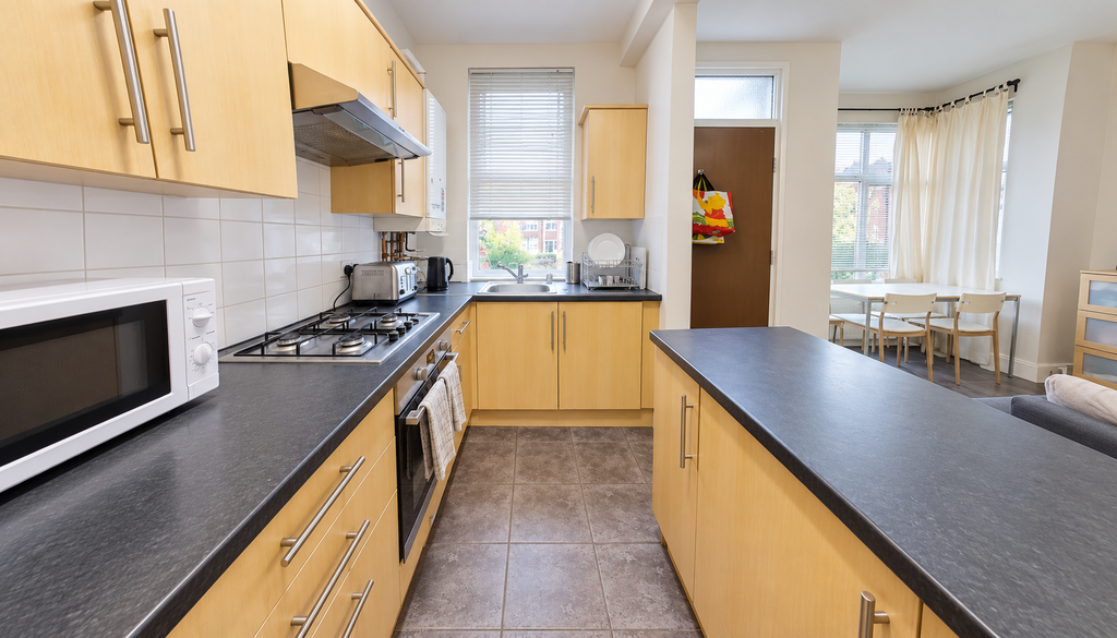 Property photo 2 of 11 Bright Modern Galley Kitchen