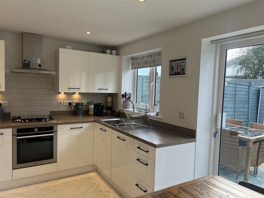 Property photo 3 of 8 Kitchen Area