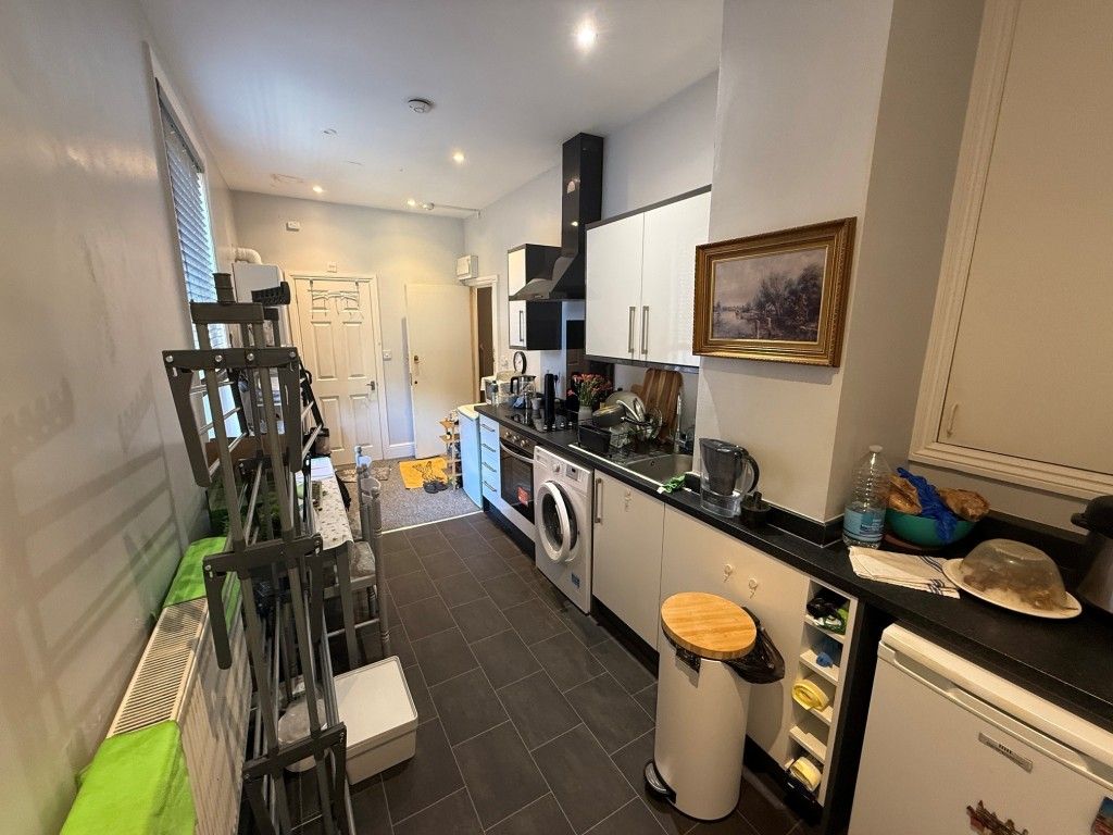Property photo 2 of 4 Galley Style Kitchen