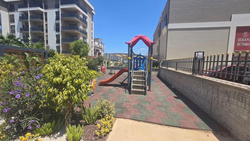 Property photo 3 of 16 Key-Ready 1-Bedroom Apartment For Sale In Antalya - Children's Playground