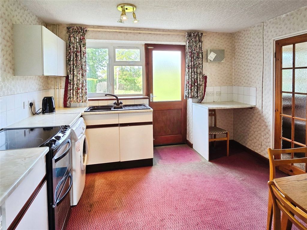 Property photo 3 of 16 Dining Kitchen