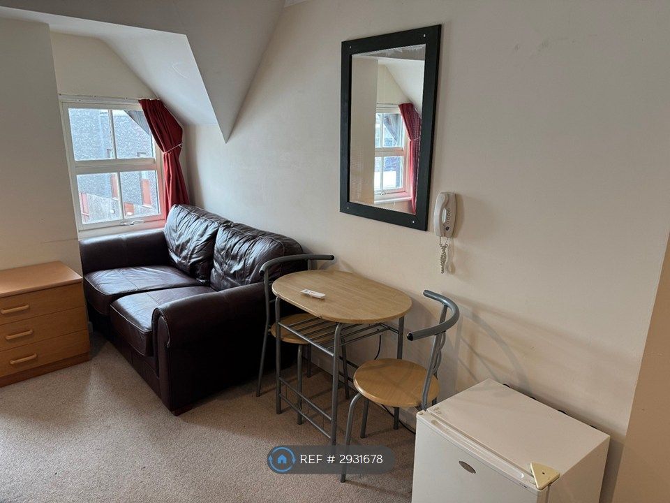 Property photo 2 of 9 Living Area