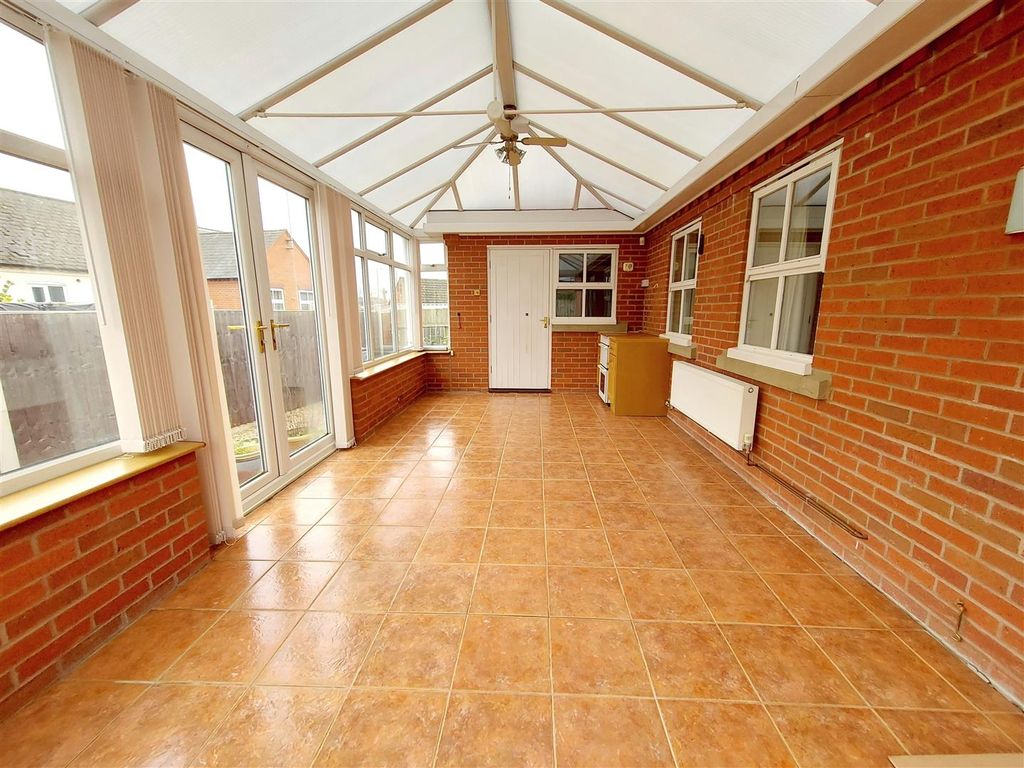 Property photo 3 of 8 Conservatory
