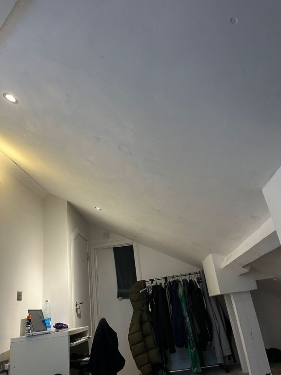 Property photo 3 of 4 Cozy Attic Bedroom With A Sloped Ceiling, Recessed...