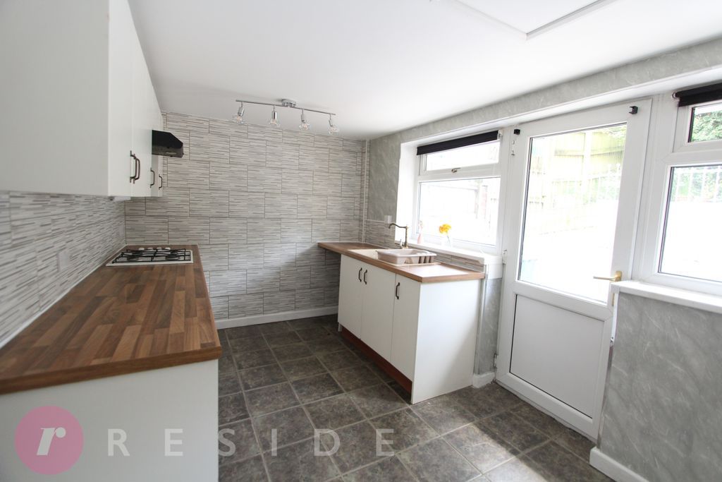 Property photo 3 of 13 Dining Kitchen