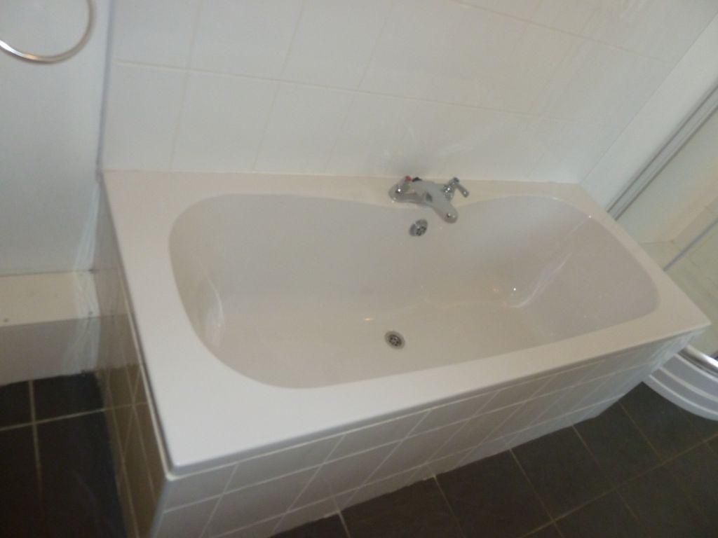 Property photo 3 of 8 A Clean And Modern Bathroom Suite Featuring A Spac...