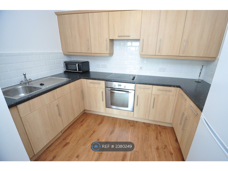 Property photo 3 of 8 Kitchen