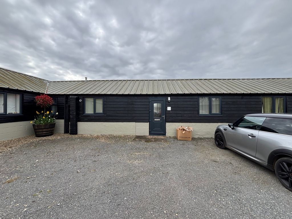 Property photo 2 of 9 Unit One Front