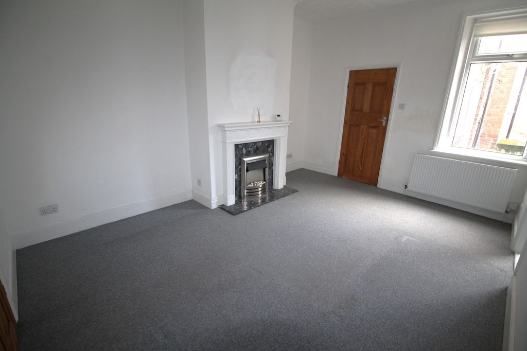 Property photo 2 of 8 Living Room