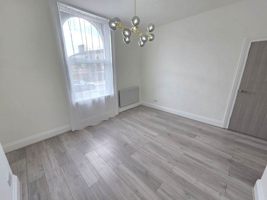 Property photo 3 of 10 Living Room