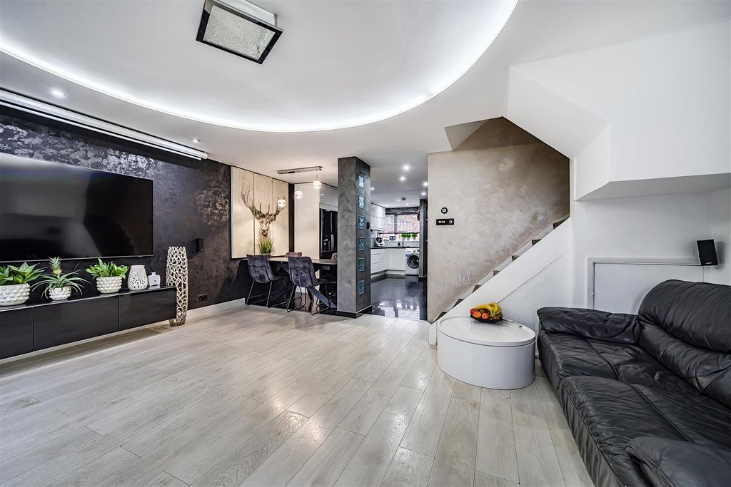 Property photo 2 of 12 Living