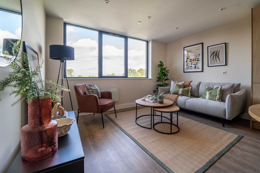 Property photo 3 of 8 Living Area