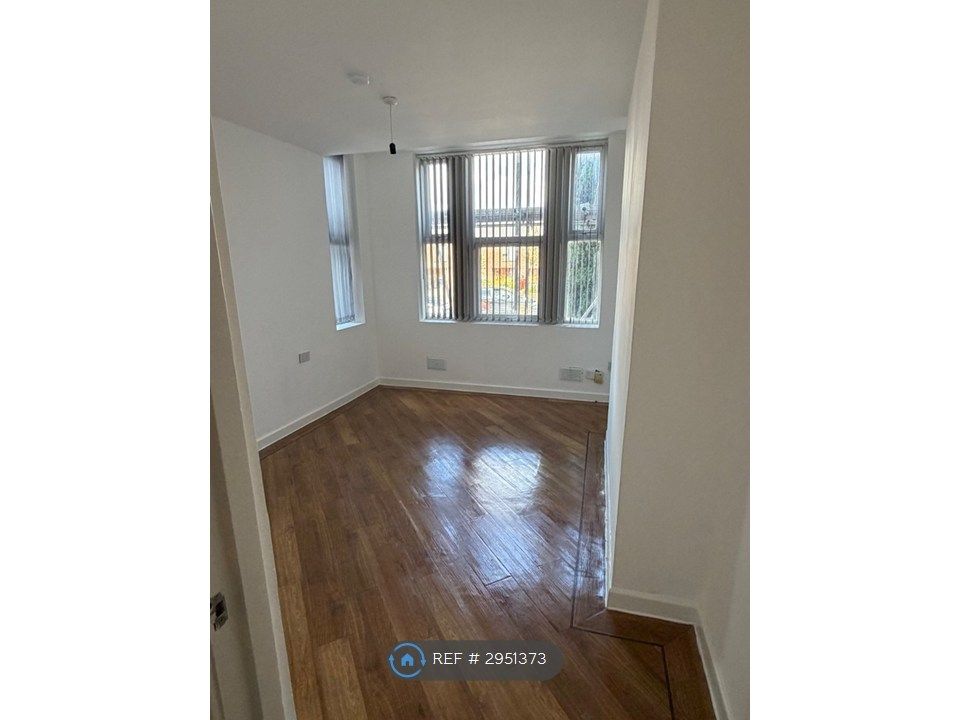 Property photo 3 of 7 Living Room Area