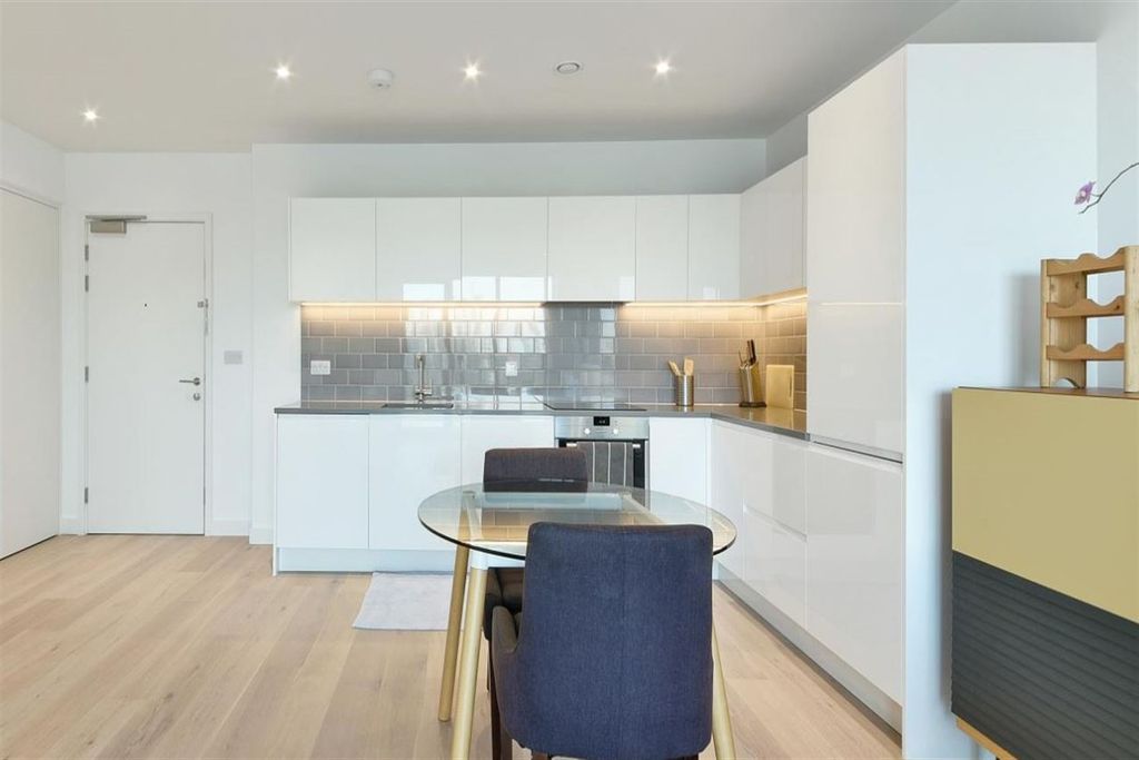 Property photo 2 of 8 Kitchen &amp; Dining