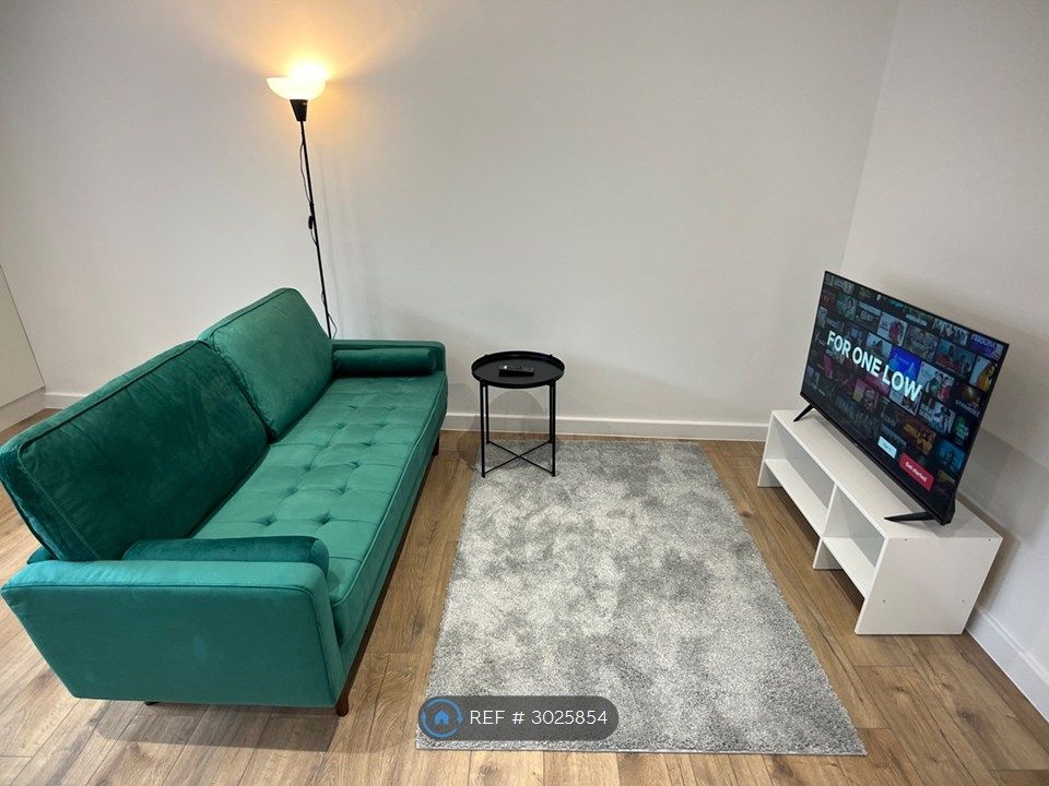 Property photo 3 of 18 Living Area