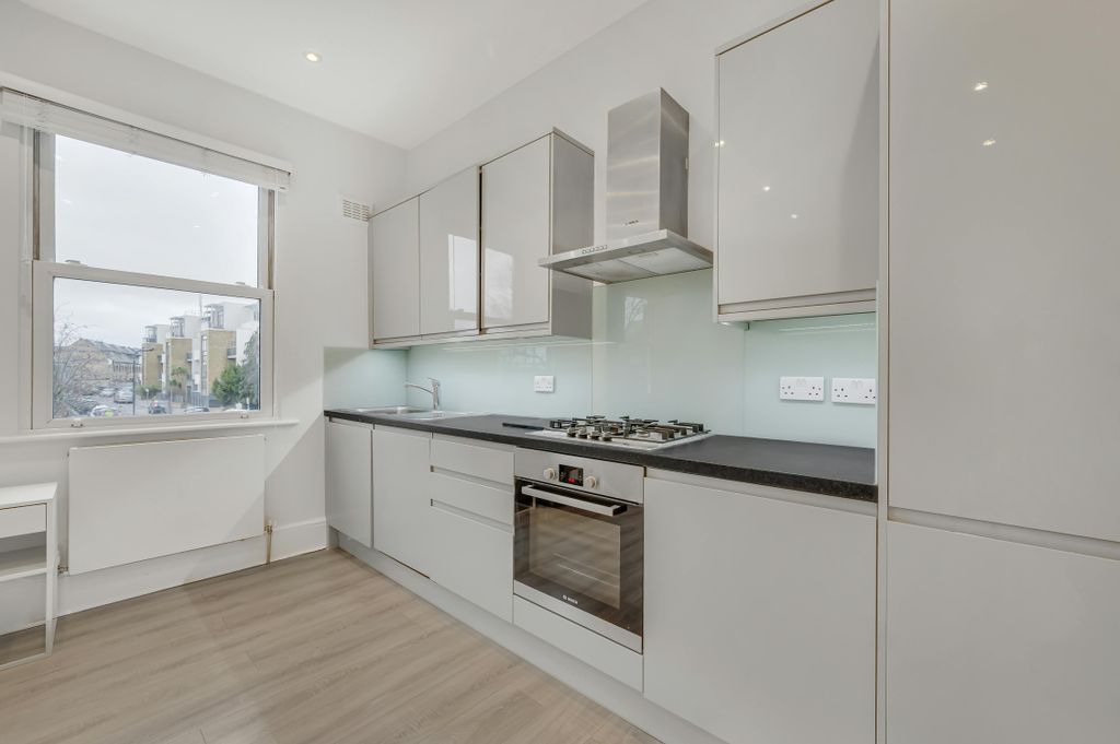 Property photo 2 of 8 Kitchen - Living Space