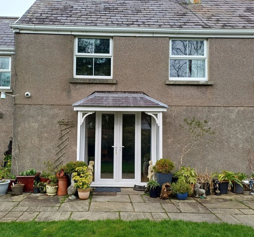 Property photo 1 of 15 Charming Patio Area With Vibrant Potted Plants...
