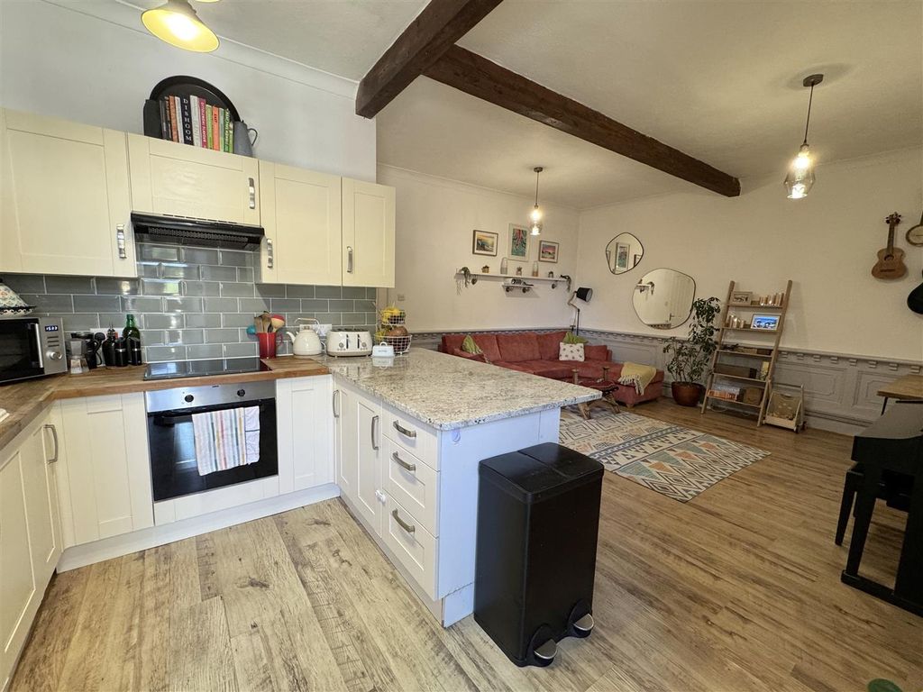 Property photo 3 of 12 Kitchen To Living Room