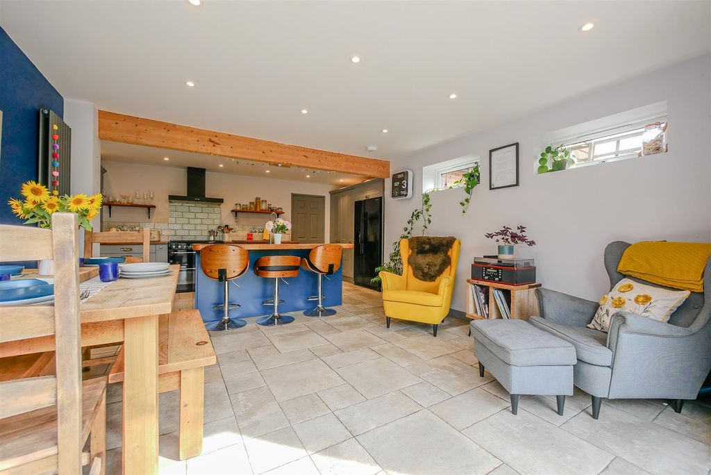 Property photo 2 of 19 Kitchen/Dining/Family Room