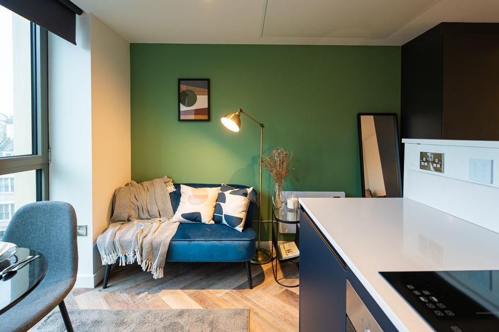 Property photo 1 of 10 A Stylish And Inviting Living Room With Modern Dec...