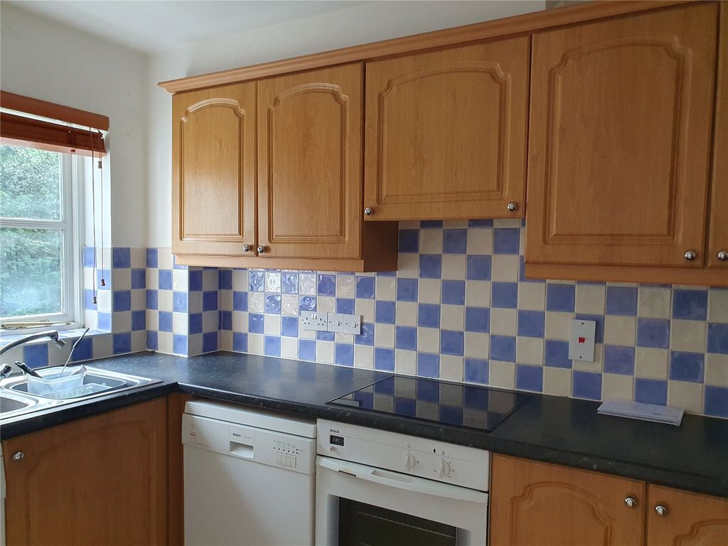 Property photo 3 of 8 Kitchen