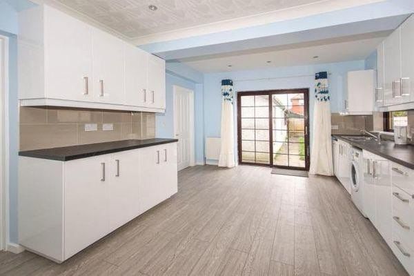 Property photo 1 of 11 Bright Modern Kitchen With Extensive White Cabinet...