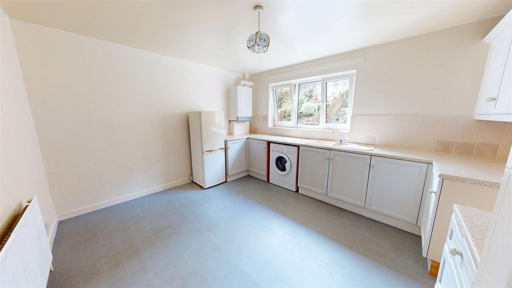 Property photo 2 of 12 Dining Kitchen