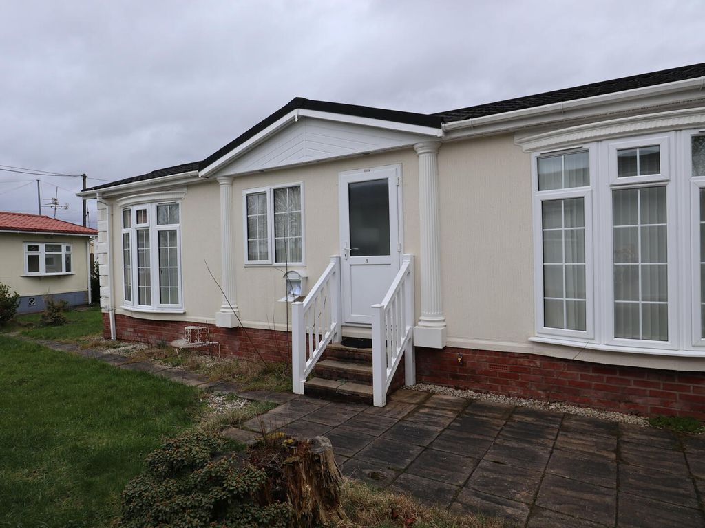 Property photo 2 of 12 Front (Exterior)