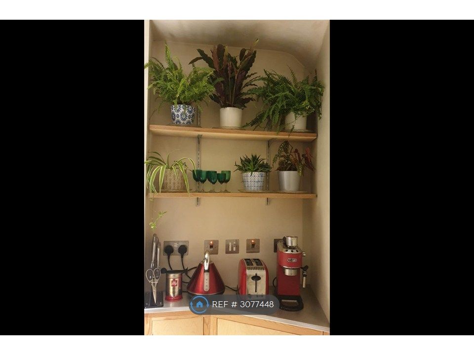 Property photo 3 of 12 Kitchen  Storage