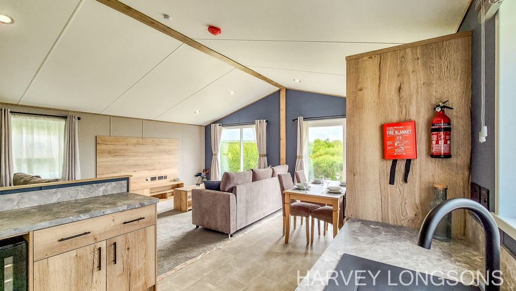 Property photo 3 of 21 Abi Superior Modern Kitchen Leading Into Open Plan Lounge And Dining Area