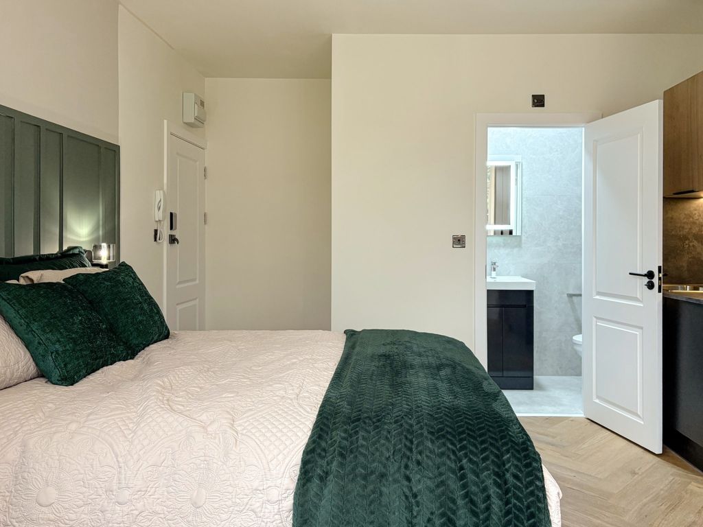 Property photo 3 of 9 Well-Presented Bedroom With A Neatly Made Double B...